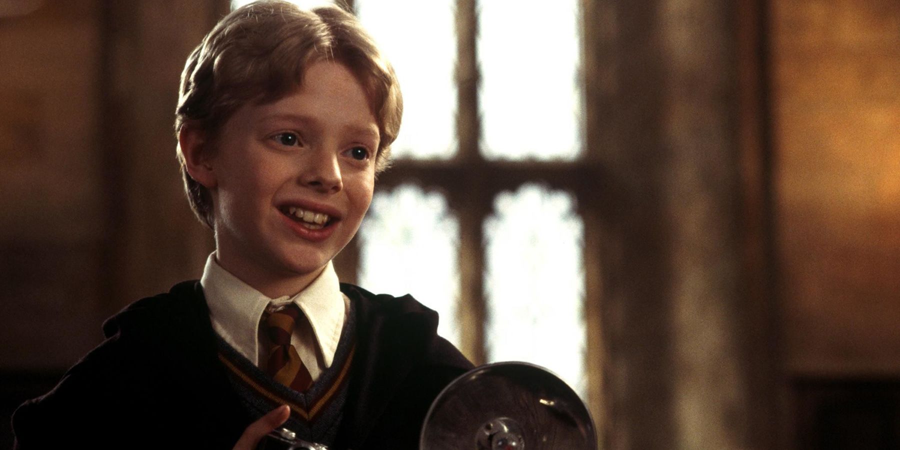 Colin Creevey holding his camera in Harry Potter and the Chamber of Secrets. 