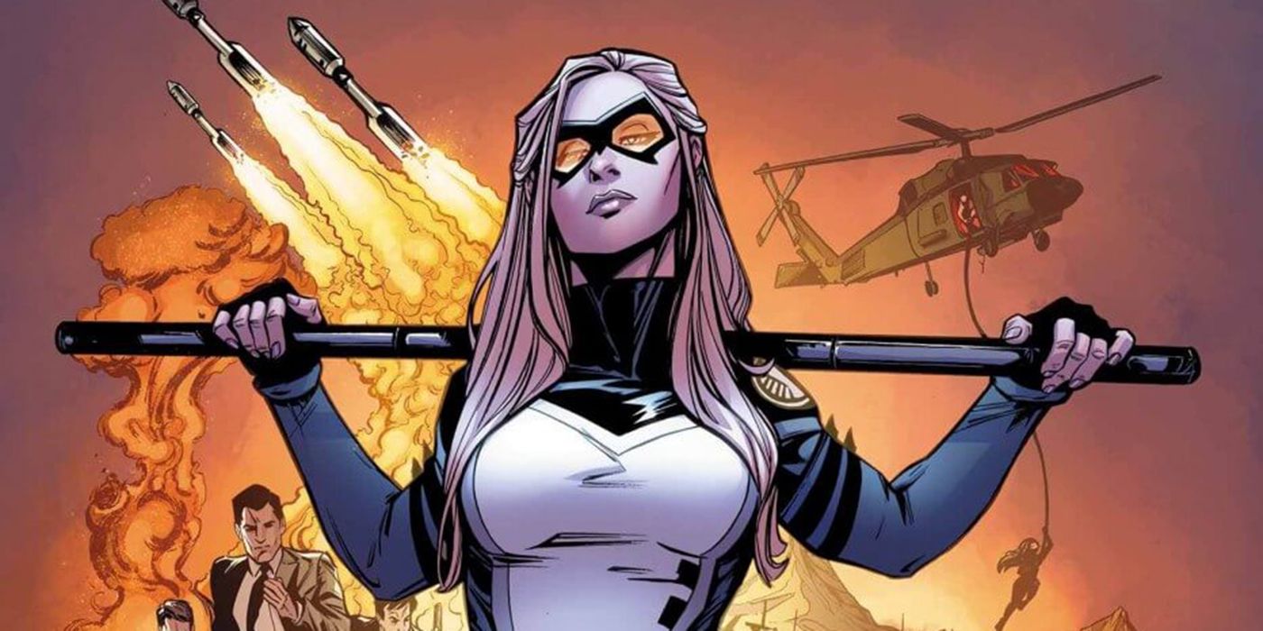 Mockingbird casually poses with her weapon resting on her shoulder.
