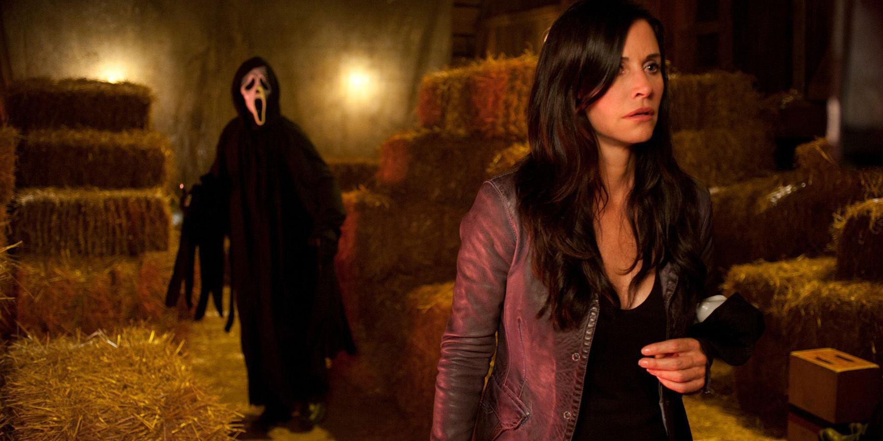 Ghostface hunts Gail in a barn in Scream 4