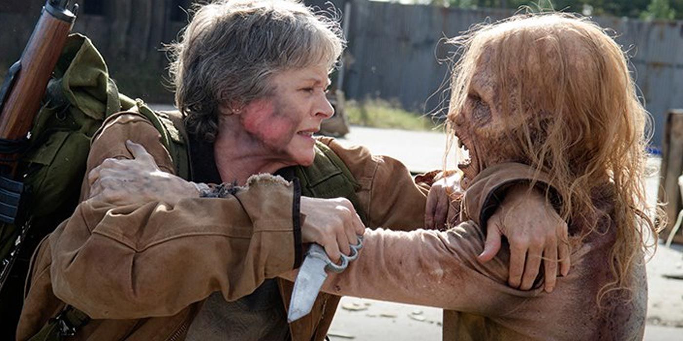 Carol fights off a Walker in The Walking Dead