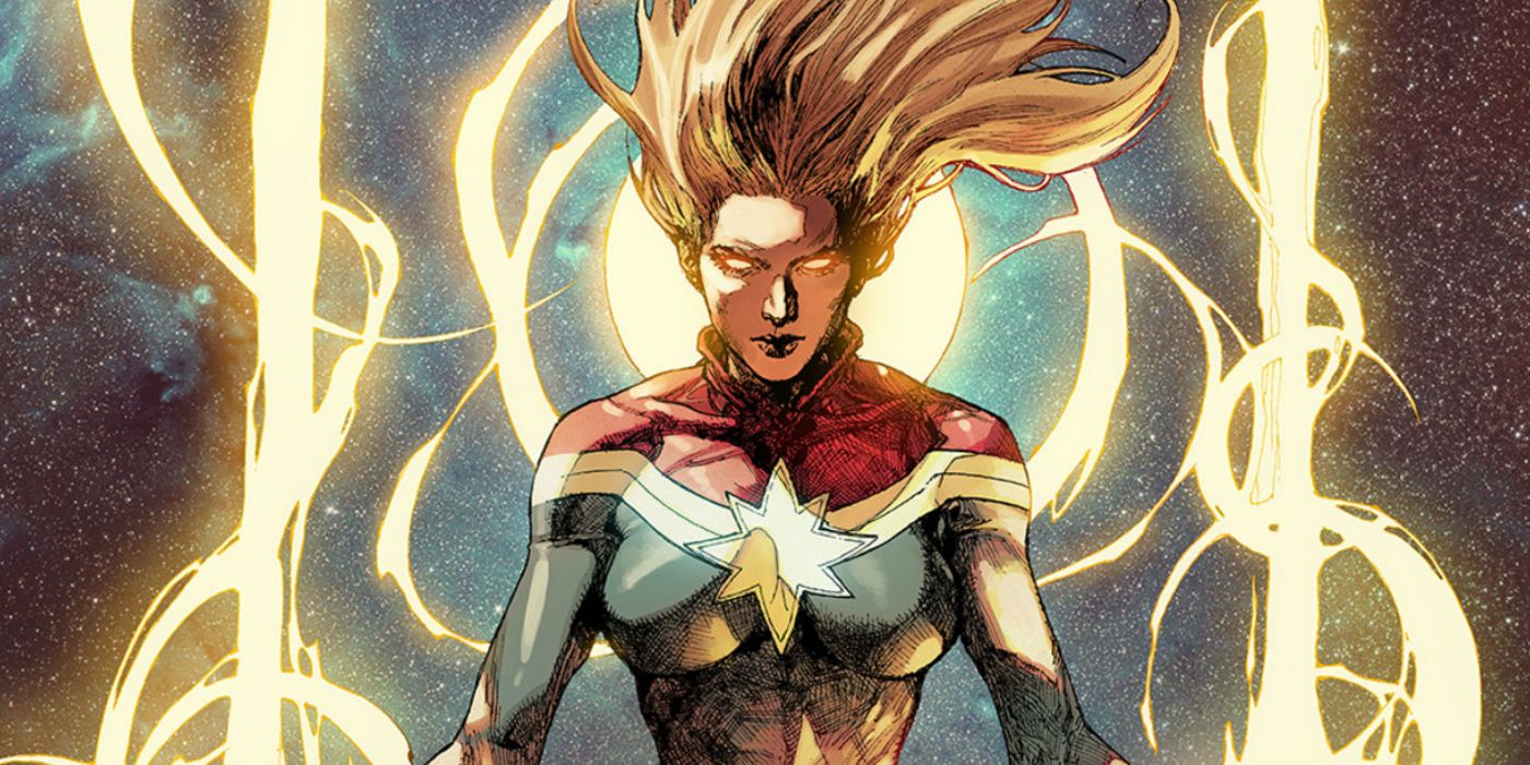 Captain Marvel's powers radiate through her eyes and crackle from her hands.