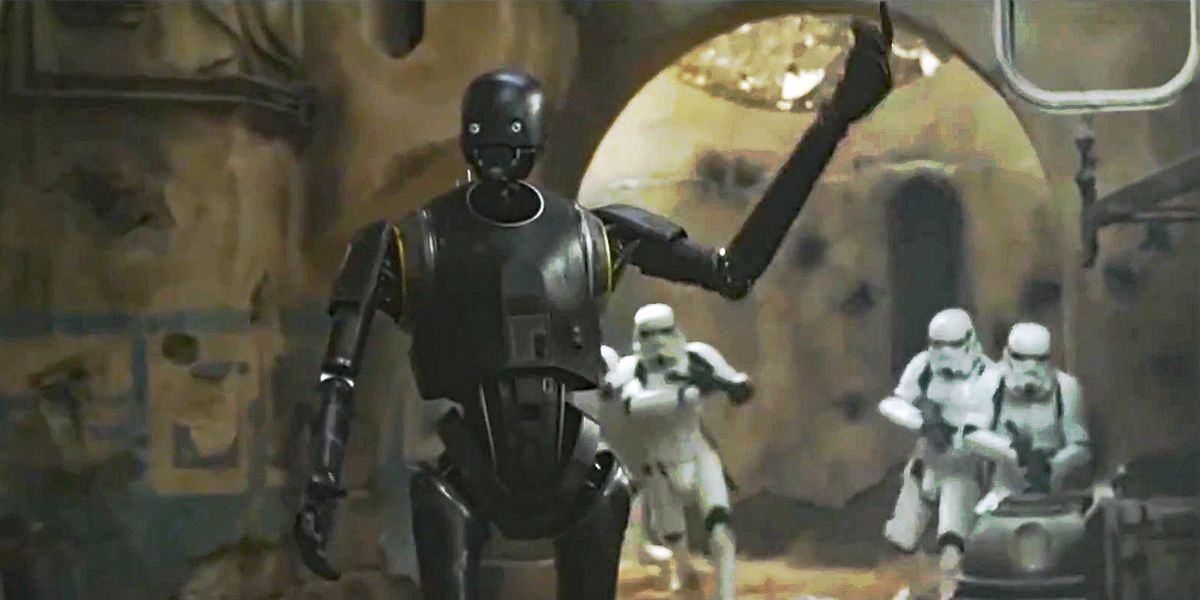 K-2SO from Rogue One with Stormtroopers in the background.