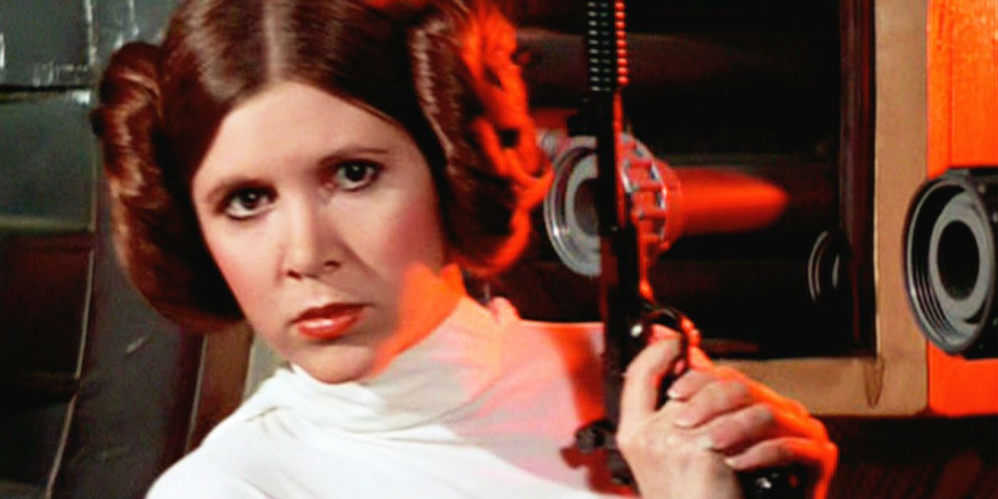 Princess Leia holding a blaster in Star Wars