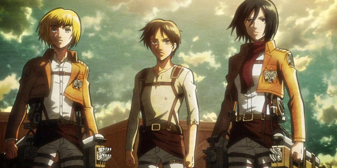 Armin, Eren, &amp; Mikasa standing next to each other