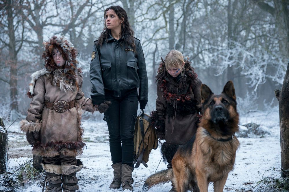 EMERALD CITY -- The Beast Forever Episode 101-- Pictured: Adria Arjona as Dorothy, Toto -- (Photo by: David Lukacs/NBC)