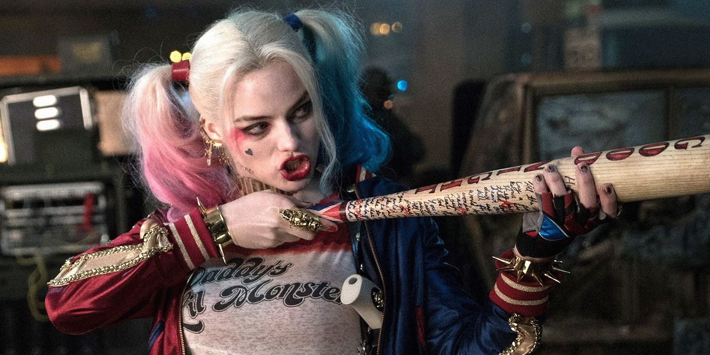 Margot Robbie's Harley Quinn aims her baseball bat like a gun in Suicide Squad