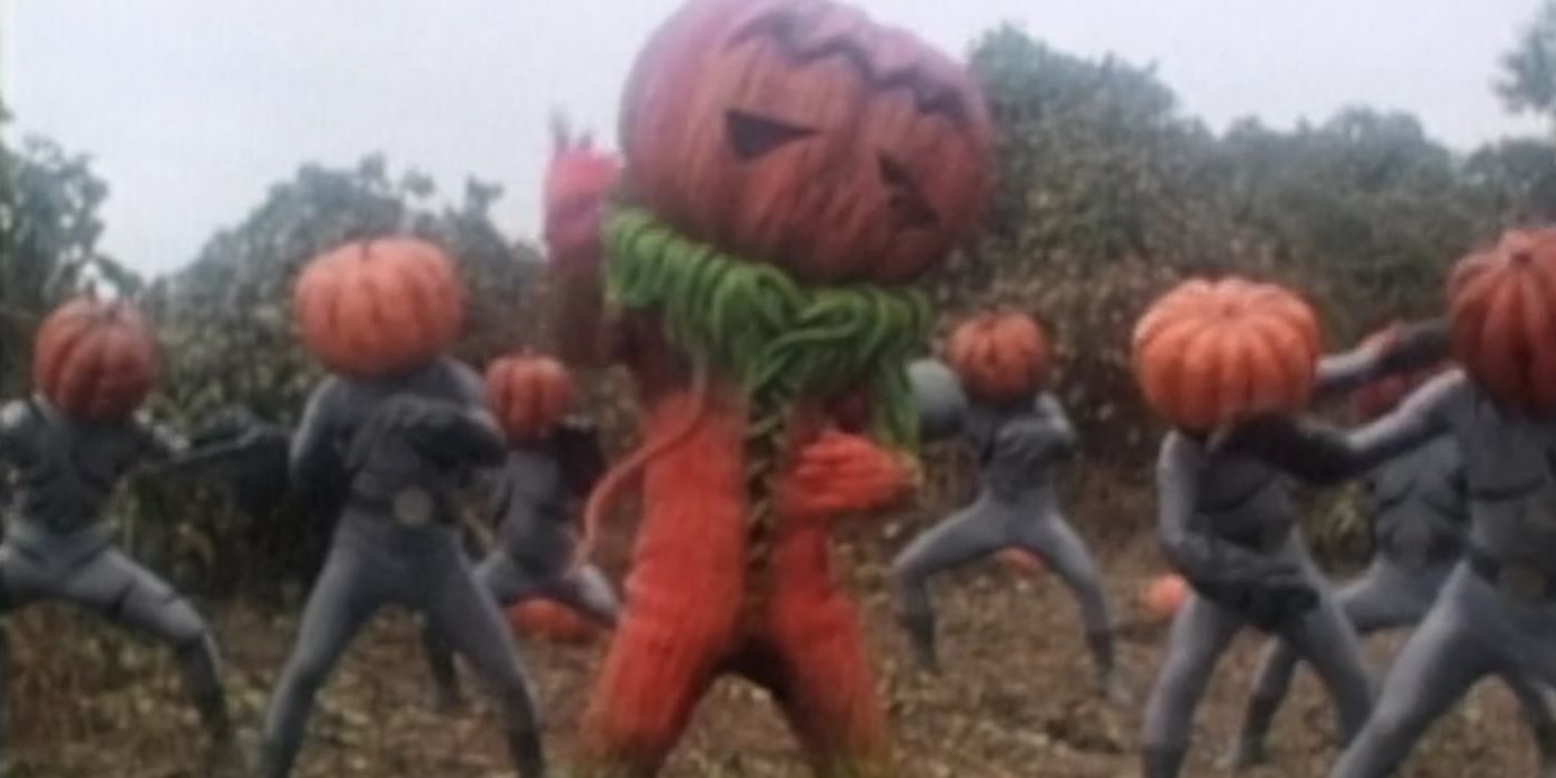 The Pumpkin Rapper stands in a group of Putties with pumpkin heads in Mighty Morphin Power Rangers