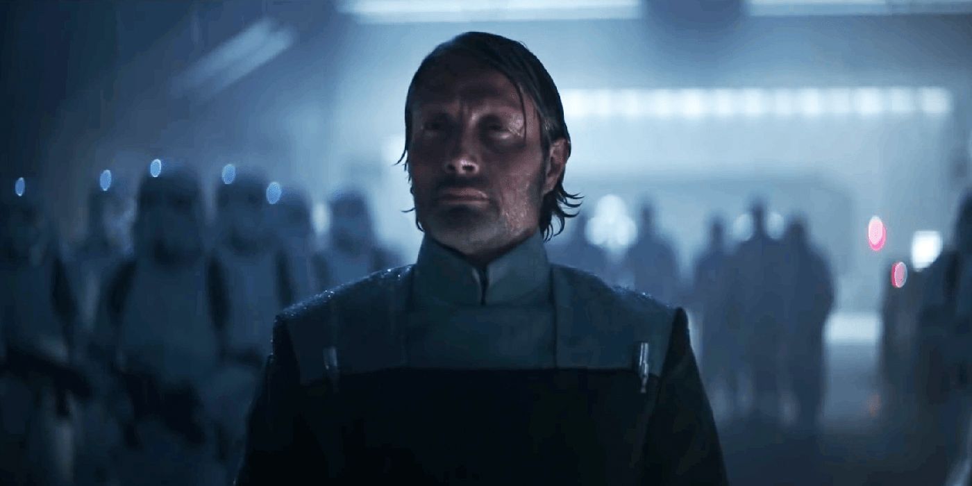 Galen Erso in front of Stormtroopers in Rogue One.