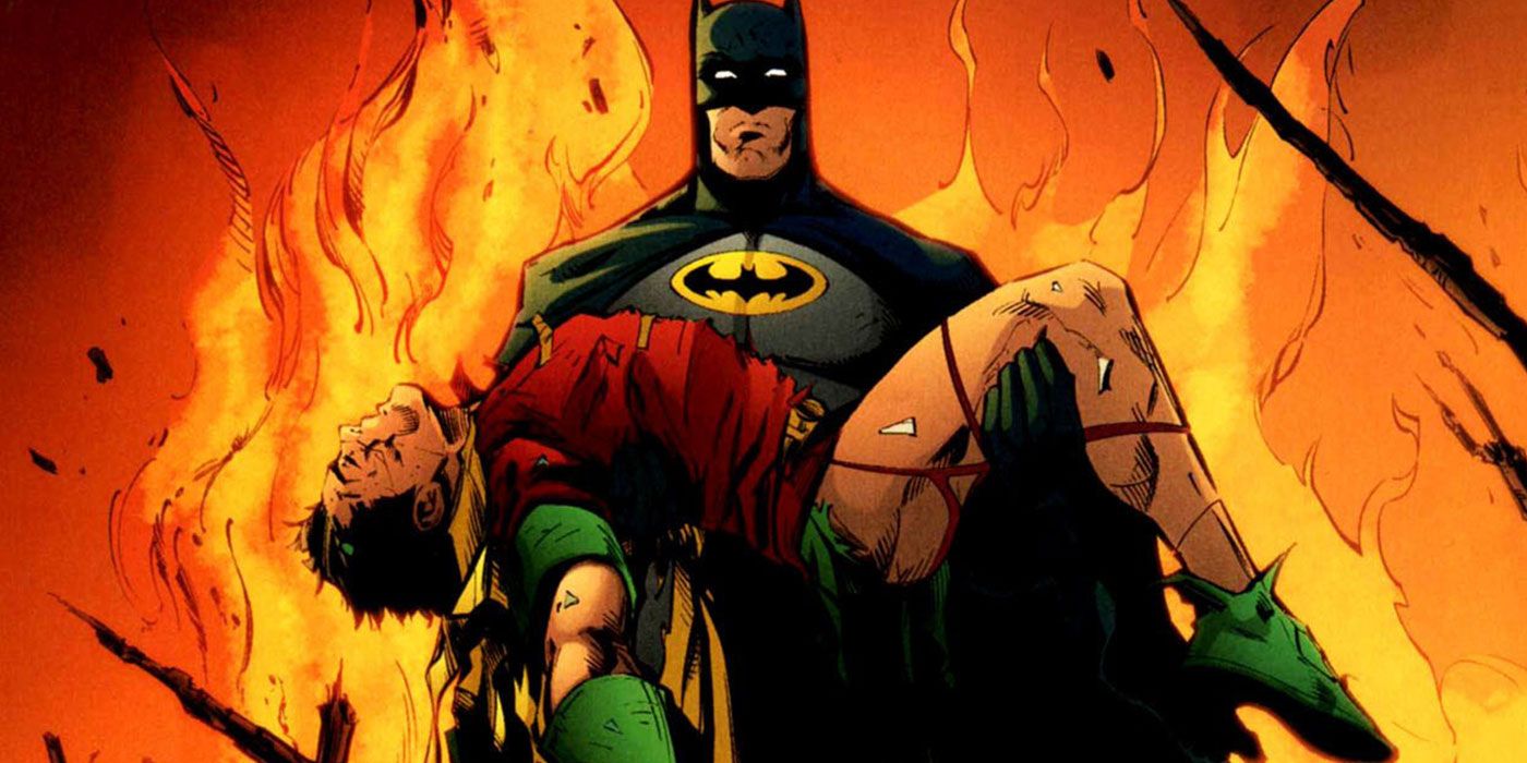 Batman holding a dead Jason Todd from DC Comics