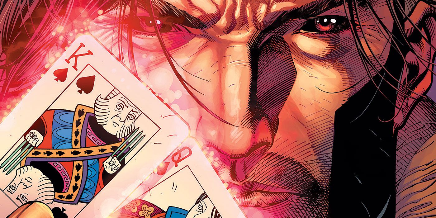 Gambit holding up glowing king and queen of spades cards in X-Men Gold.