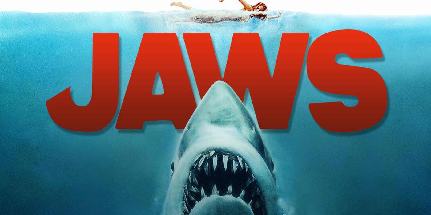 Woman swimming above a shark on the Jaws poster.