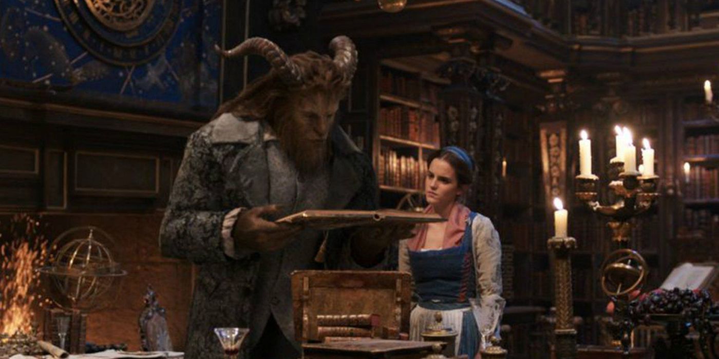 Beast showing Belle his library