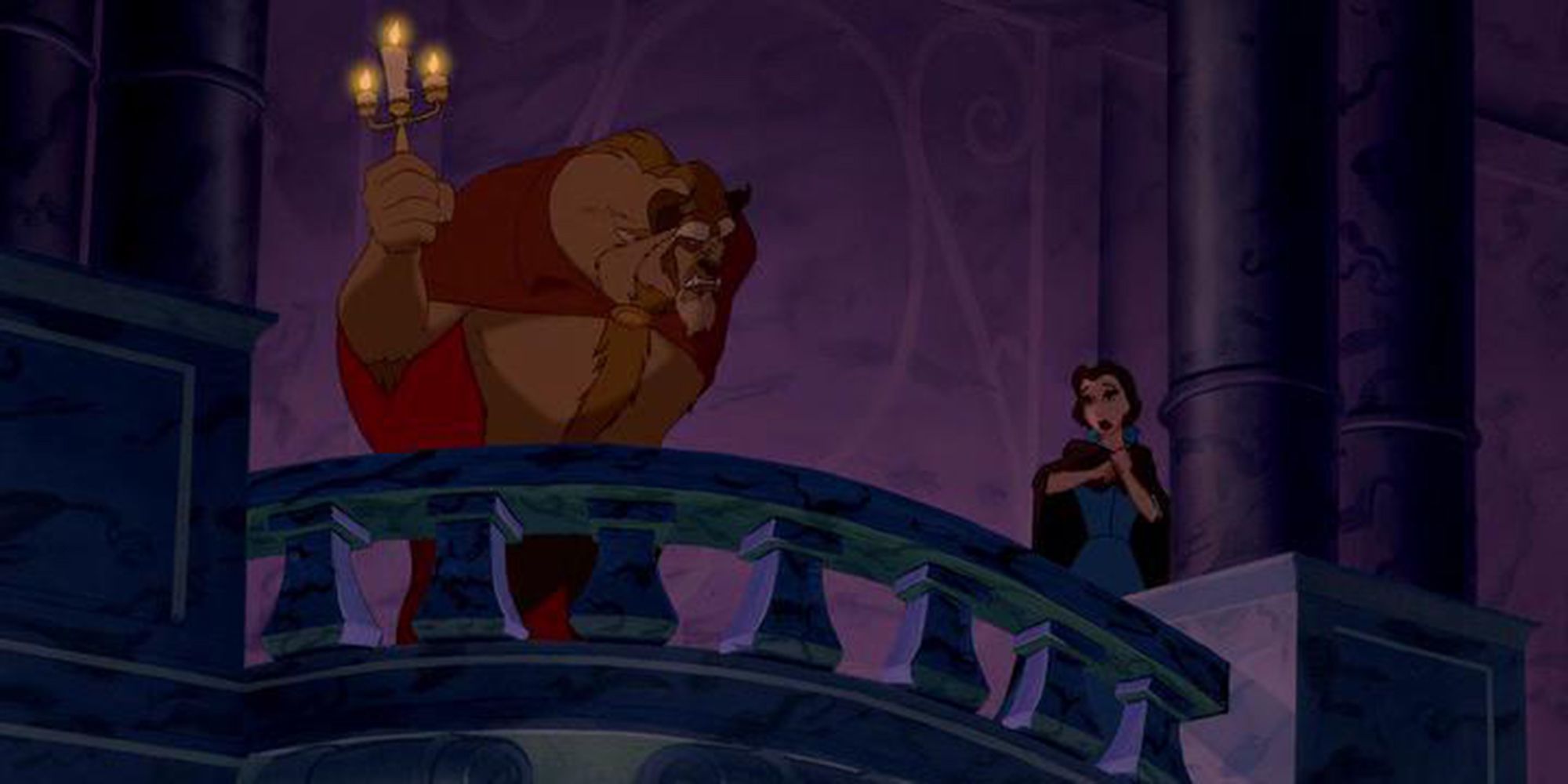 Belle and the Beast on a balcony