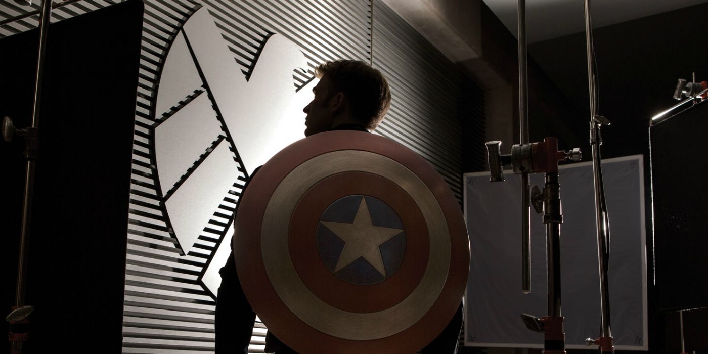 Steve Rogers looking at a SHIELD logo in Captain America: The Winter Soldier.