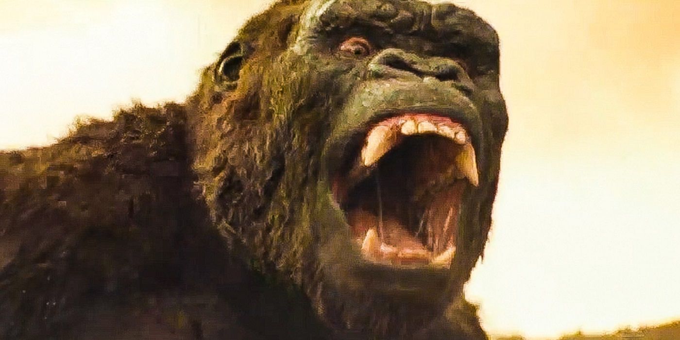 A close-up of King Kong roaring with fanged teeth