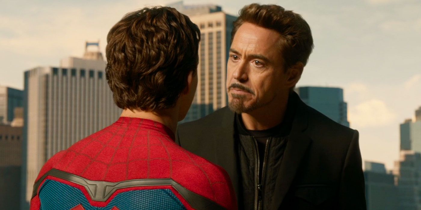 Tony Stark looks at Peter Park's Spider-Man with an annoyed look on his face