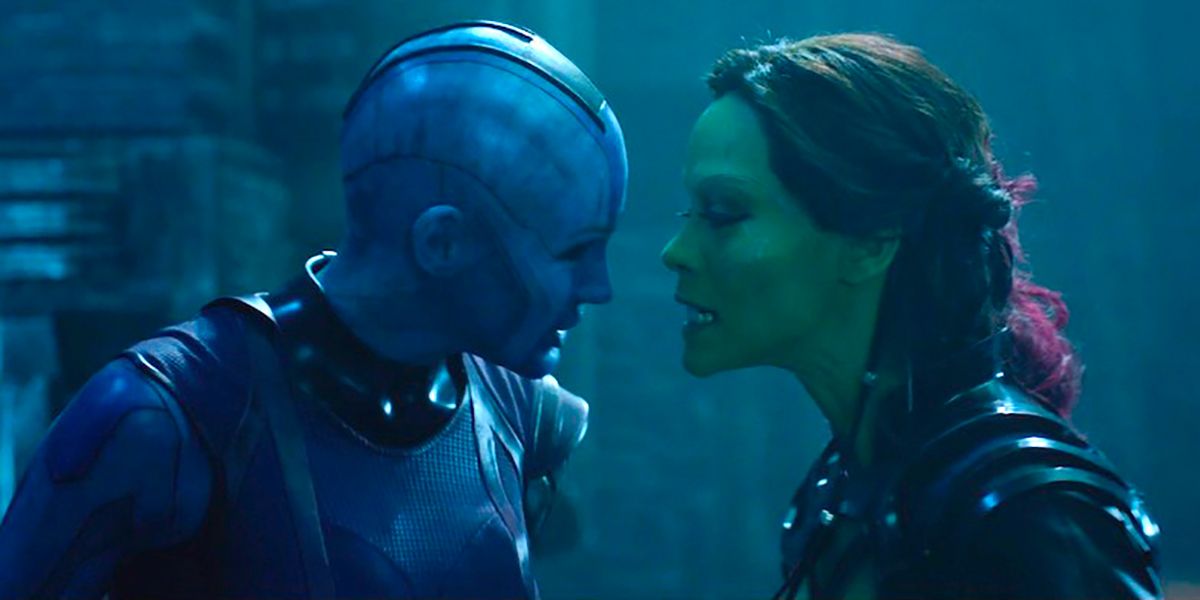 Gamora and Nebula argue with their faces close together
