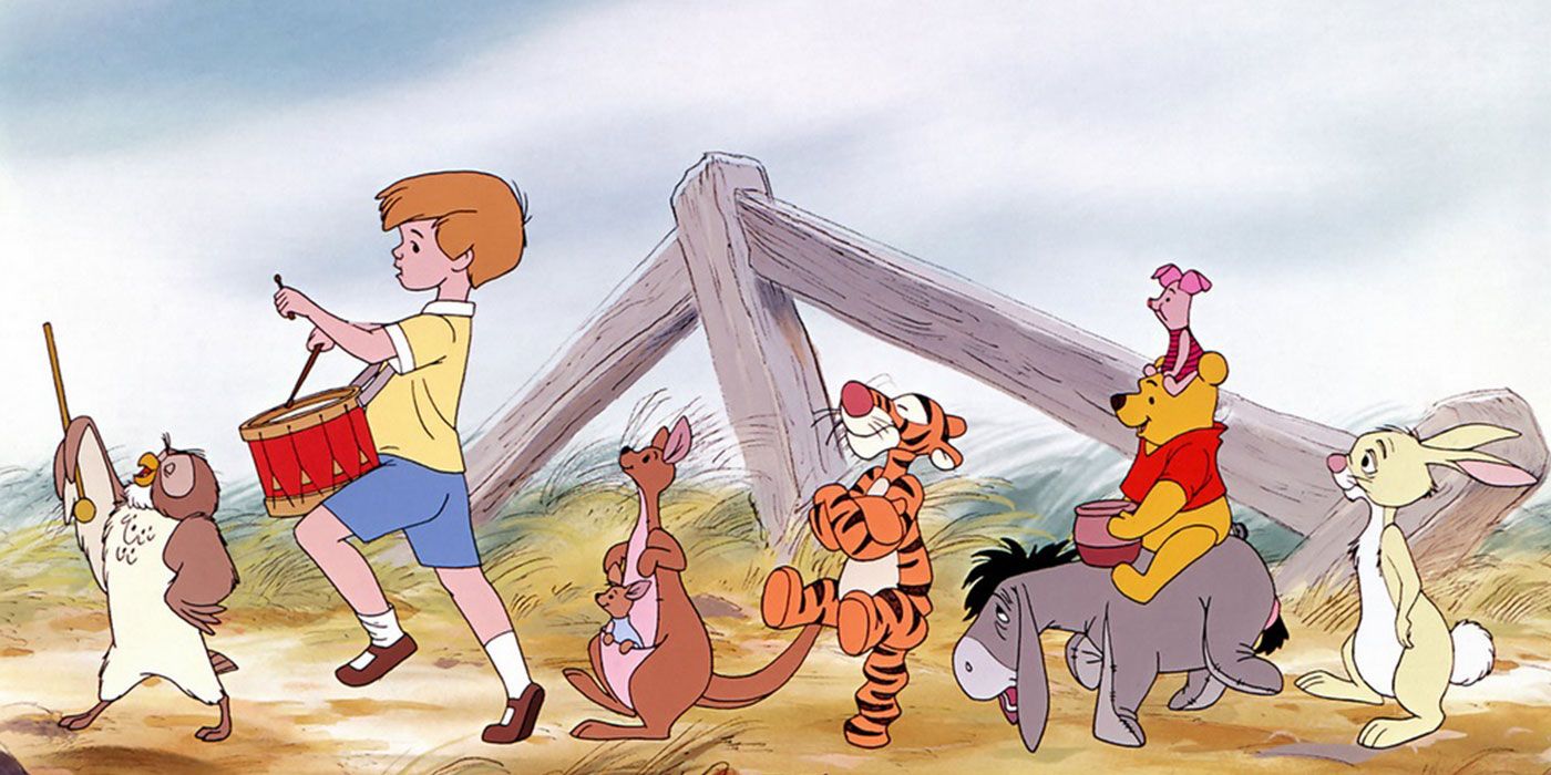 Owl leads the animals and Christopher Robin in The New Adventures of Winnie the Pooh