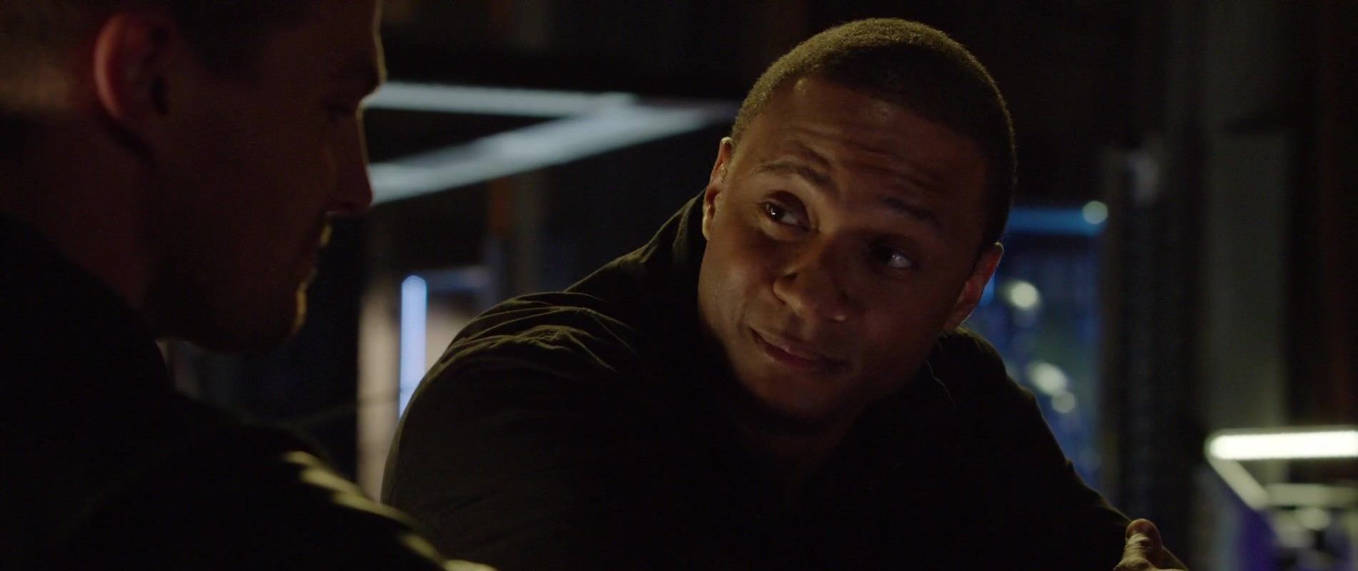 John Diggle listening to Oliver Queen in Arrow