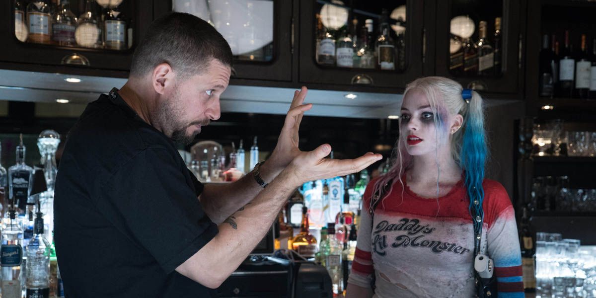 david ayer and margot robbie on the set of suicide squad