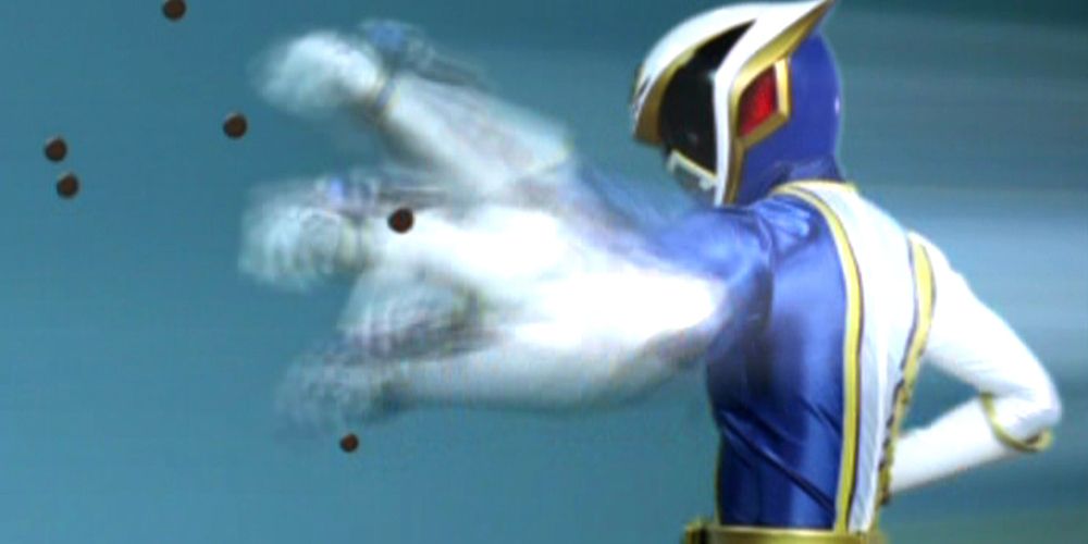 The Omega SPD Ranger using his quick fist in battle