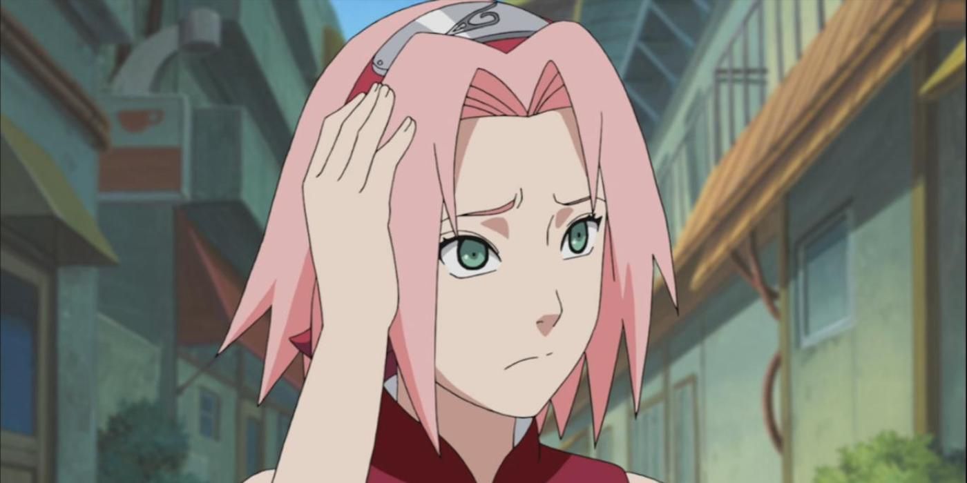 Sakura looking concerned and holding a hand to her hair in Naruto.