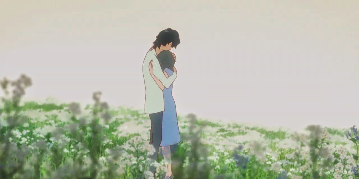 Ookami and Hana embracing in a field of white flowers from Wolf Children.