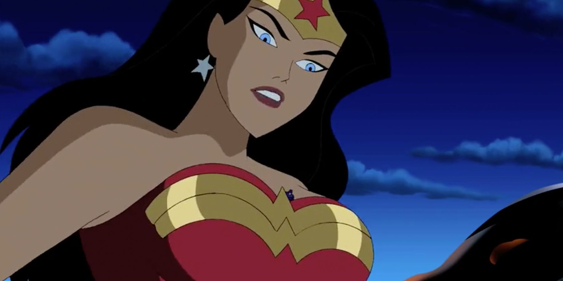 Atom hiding in Wonder Woman's cleavage