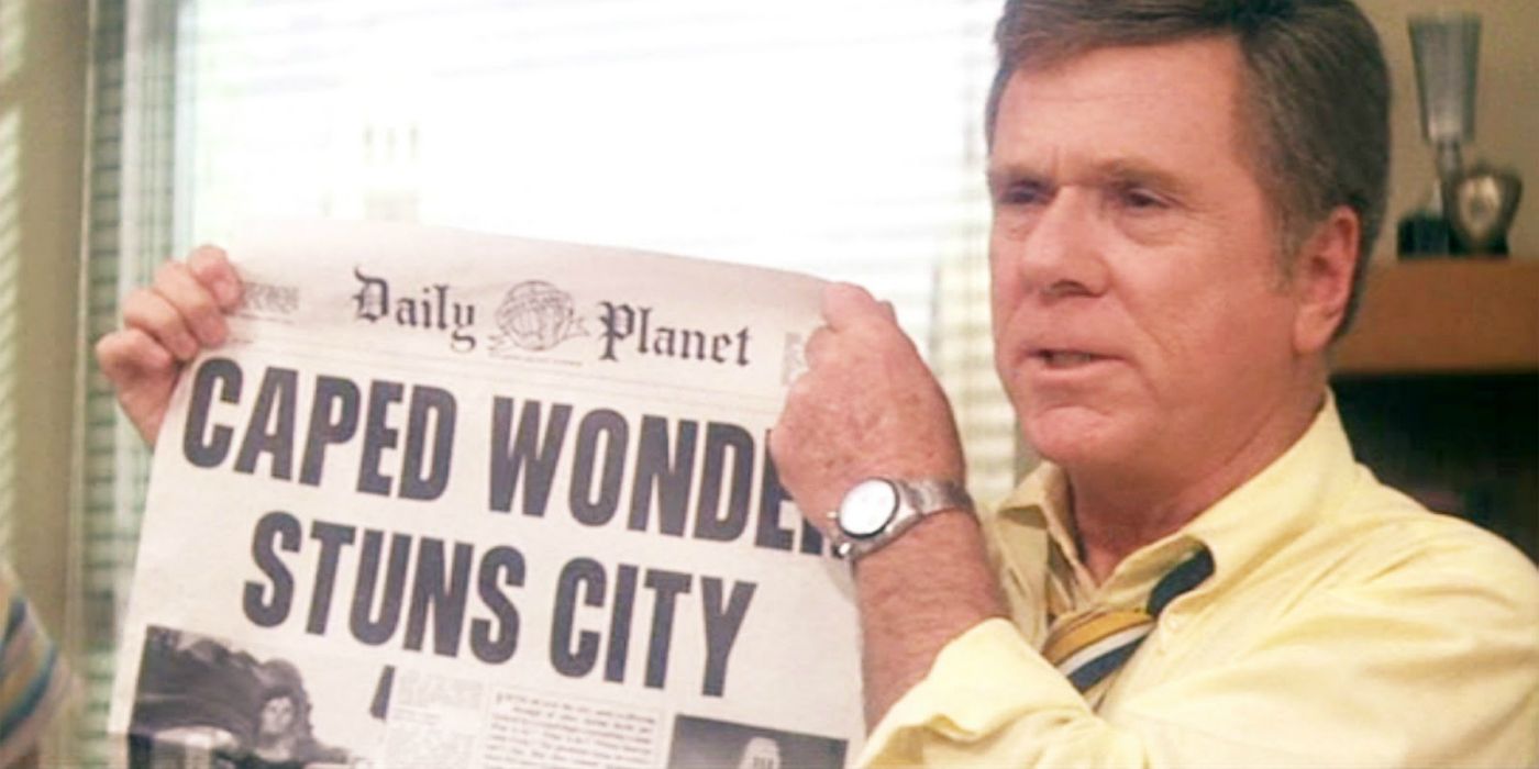 Jackie Cooper Jr.'s Perry White holding up a newspaper in Superman