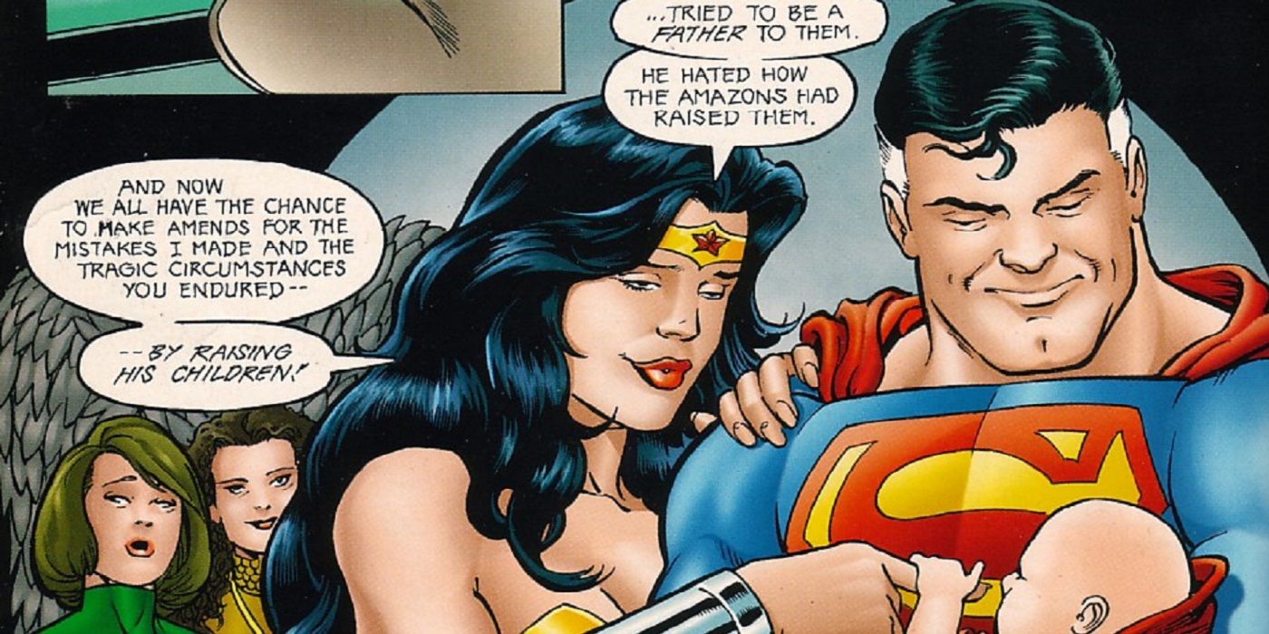 Superman and Wonder Woman hold their baby