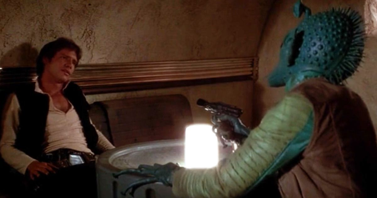 Han Solo and Greedo aim blasters at each other in Star Wars