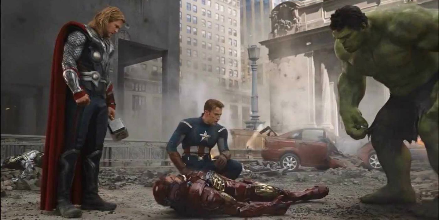Thor, Captain America and Hulk stand around a seemingly dead Iron Man in Avengers