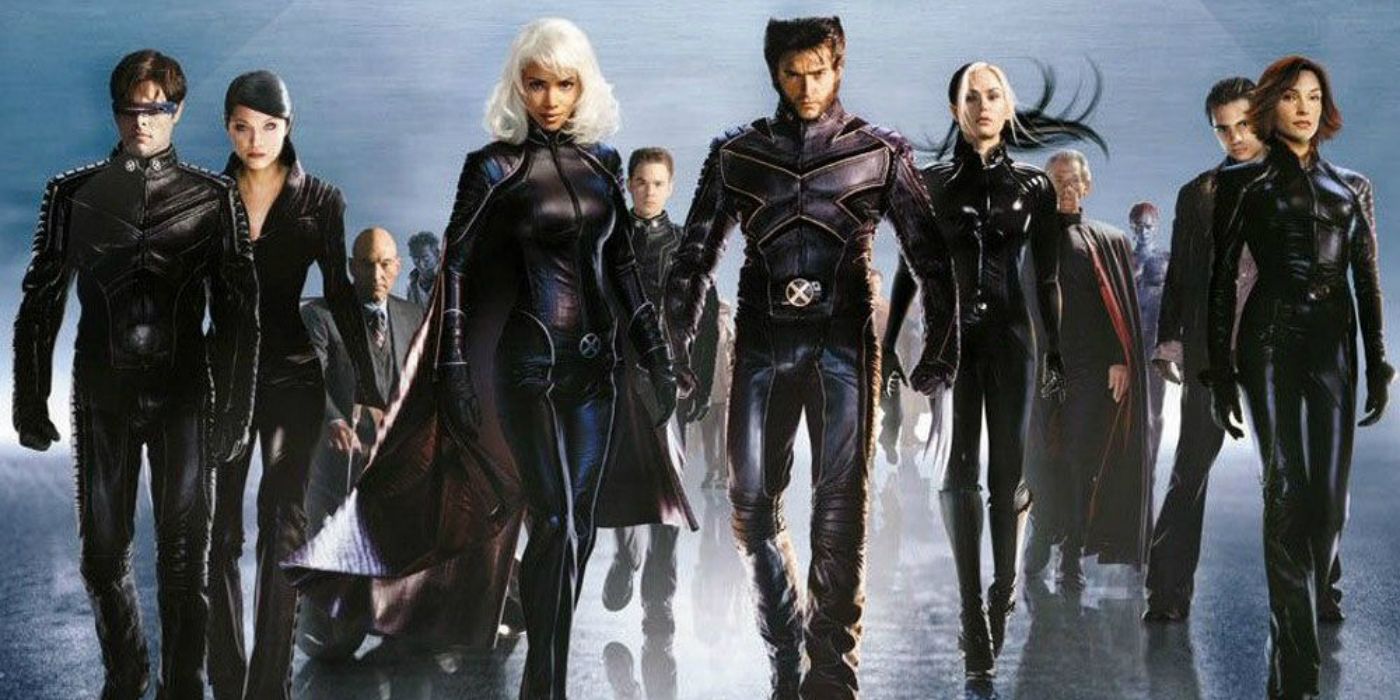 The X-Men cast in costume walking toward the camera in X2