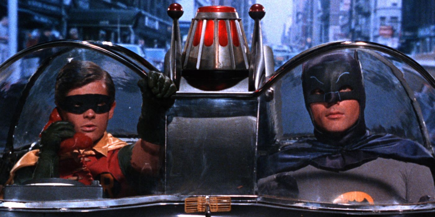 Batman and Robin (Adam West and Burt Ward) driving in the Batmobile