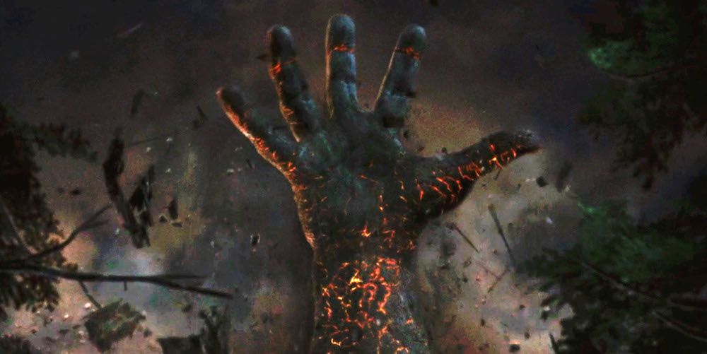 An Ancient One's gigantic hand rises up during the ending of The Cabin in the Woods