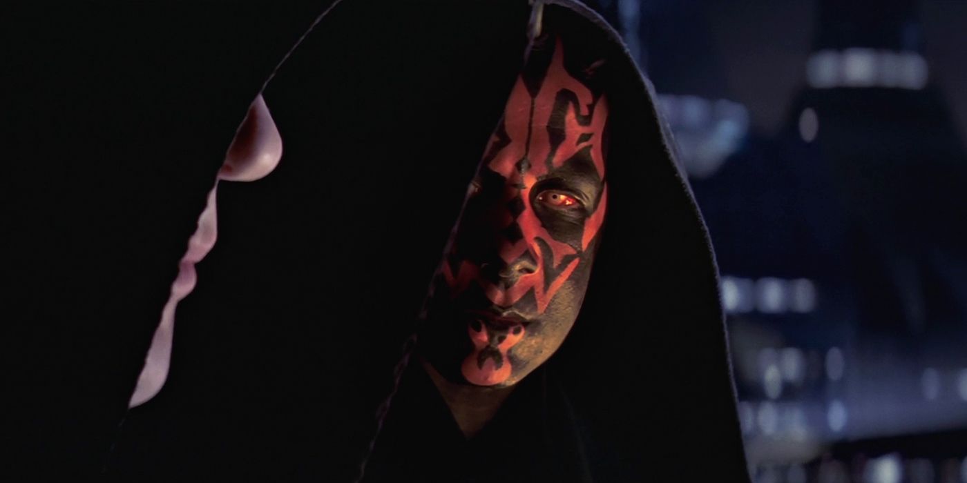 Darth Maul stares at Chancellor Palpatine in his Darth Sidious form