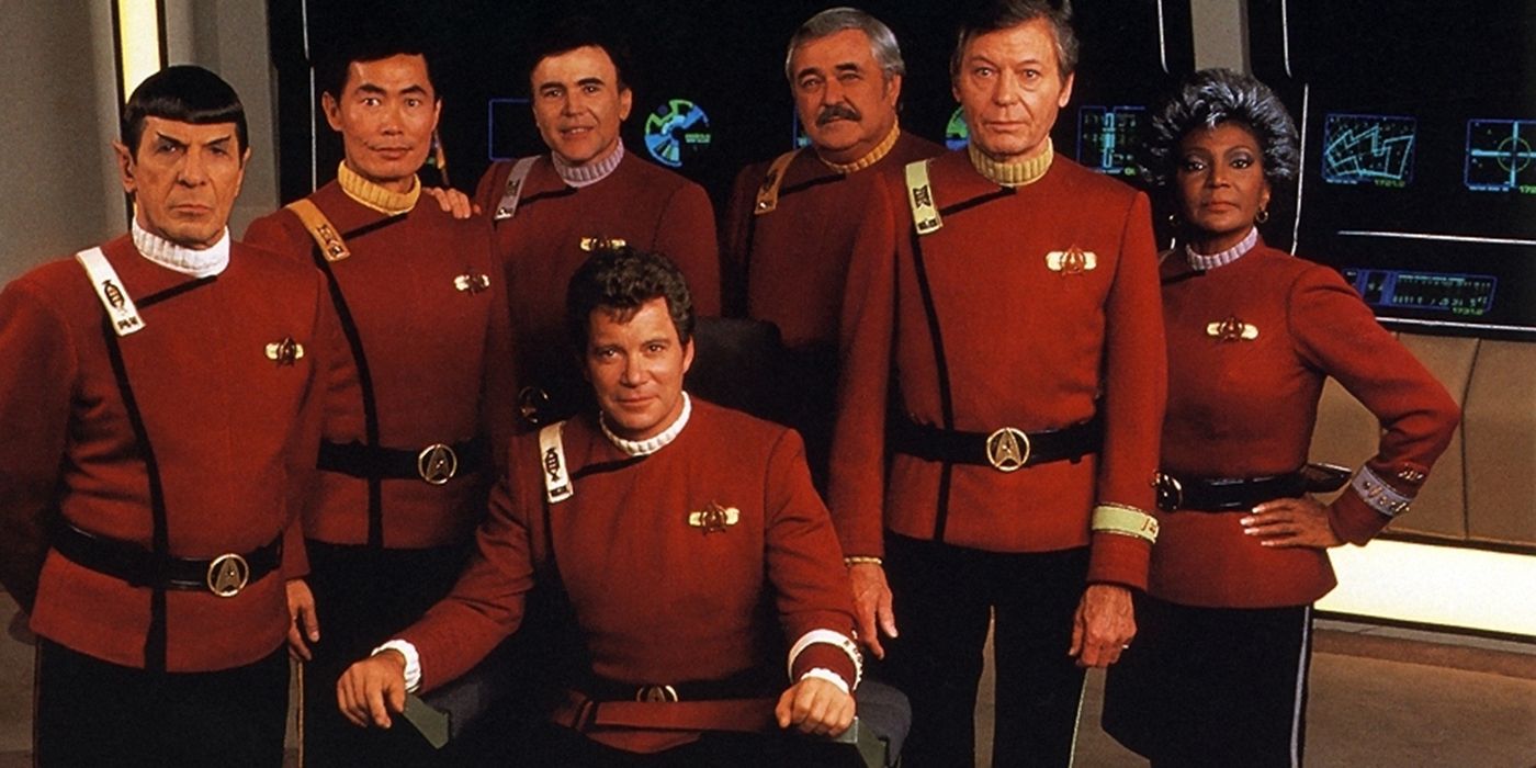 Star Trek: The Original Series cast standing around William Shatner's Kirk.