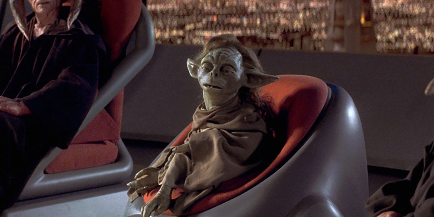 Yaddle sits in a chair at the Jedi Council