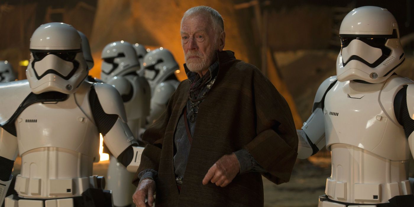 Christopher Plummer as Lor San Tekka getting taken away by Stormtroopers in Star Wars: The Force Awakens