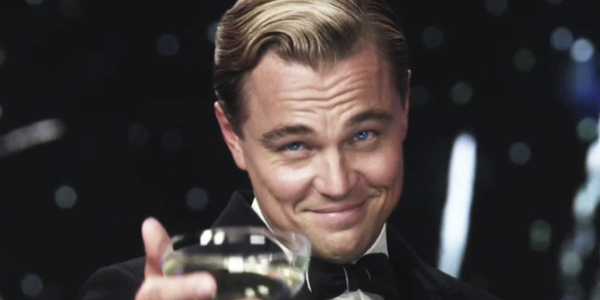 Leonardo DiCaprio raising his glass