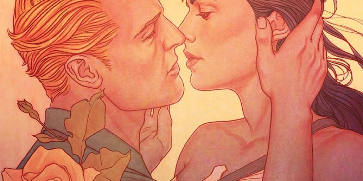 Wonder Woman and Steve Trevor lean in to kiss each other in the sun