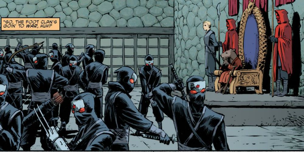 Members of the Foot Clan training next to Jennika and Splinter, who look at them