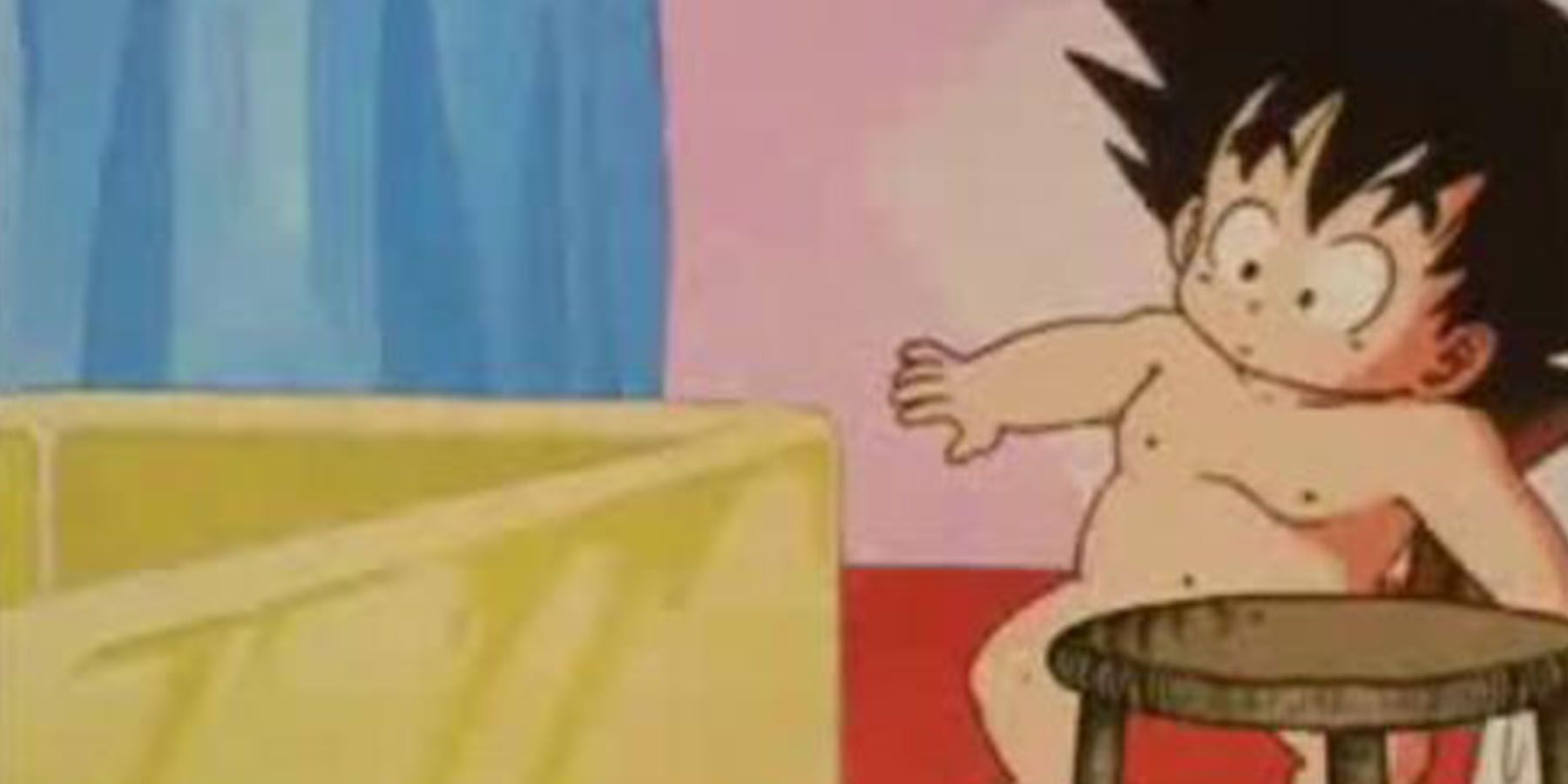 Baby Goku's nudity covered by a table in Dragon Ball