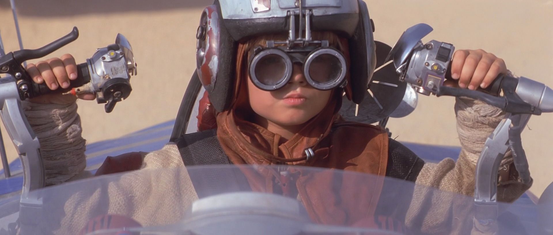 Anakin sitting in the cockpit of his podracer