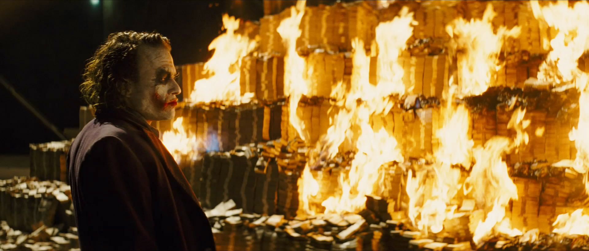 Heath Ledger Joker Sets Fire to Money in The Dark Knight