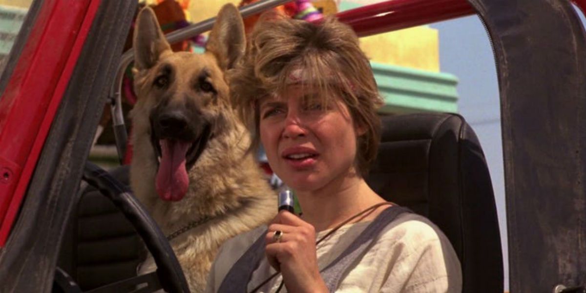 sarah connor is in a jeep with a dog in the terminator
