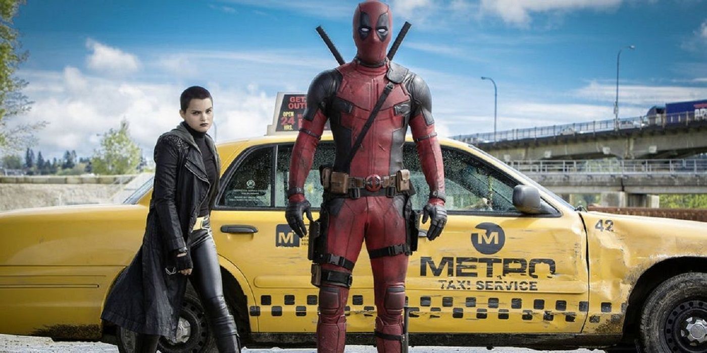 Deadpool and Negasonic Teenage warhead get out of a taxi.