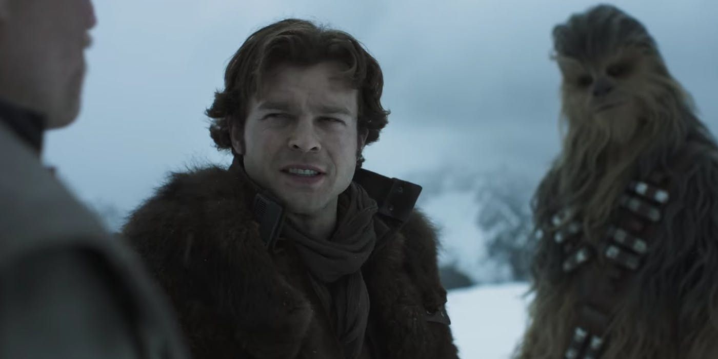 Han Solo and Chewbecca stand together on a snowy planet