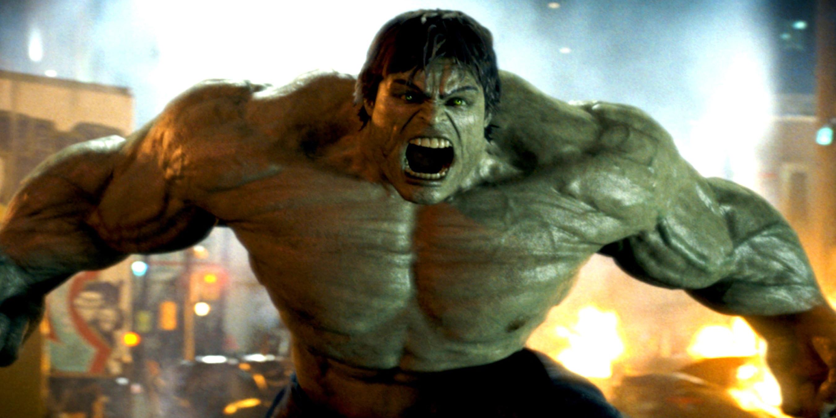 The Hulk standing with arms spread out, yelling in anger