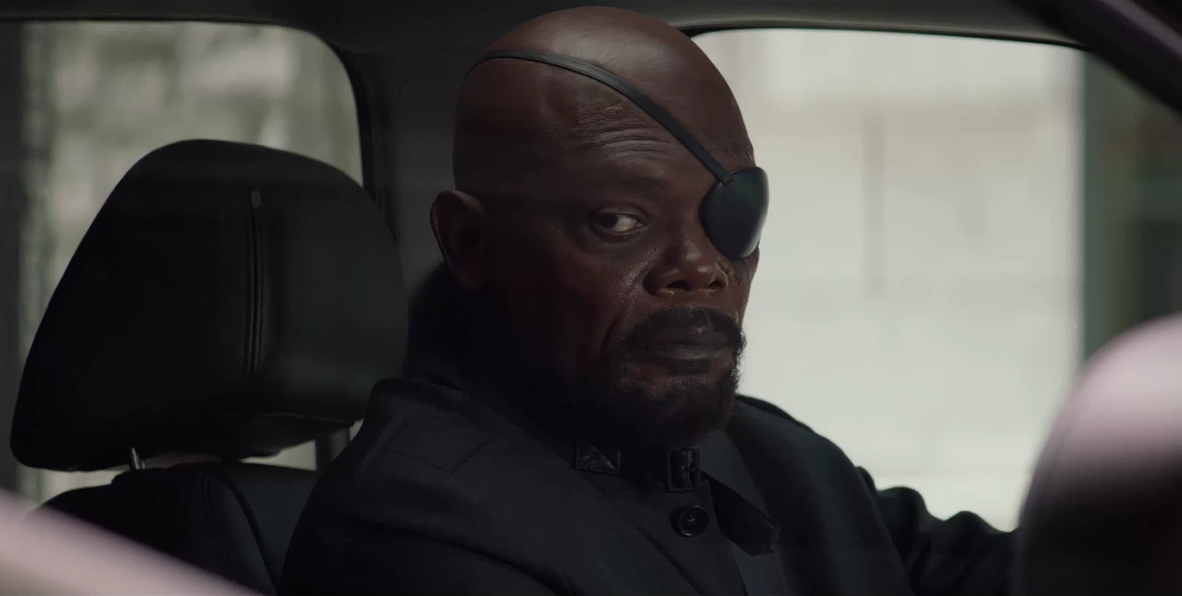 Nick Fury driving while under attack from HYDRA in Captain America: The Winter Soldier